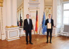 Regierungspräsident Axel Bartelt und Daniel Berzl